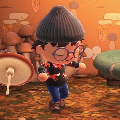 Photo taken in game. Animal Crossing character wearing the Running Fox jumper they designed in game.