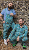Tom and GayBear wearing the bunny stretch twill boiler suit and bunny stretch twill dungarees. Tom has paired the bunny boilersuit with green boots and GayBear has paired the dungarees with a pastel blue shirt and white trainers.