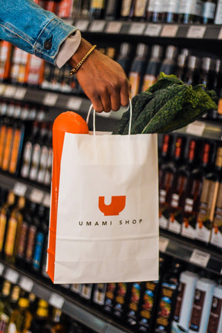 fresh kale in Umami Shop shopping bag sustainability eco friendly local