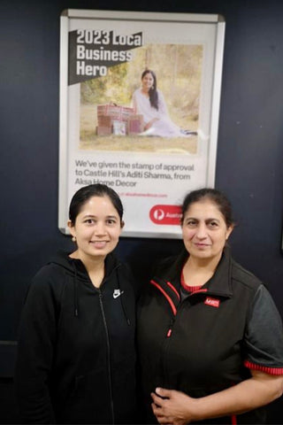 Aditi with Castle Hill Post Office Manager