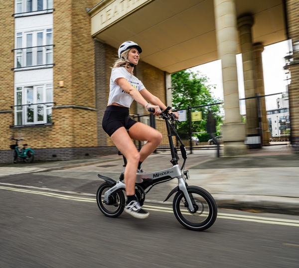 Girl riding a MiRider One GB3 electric bike