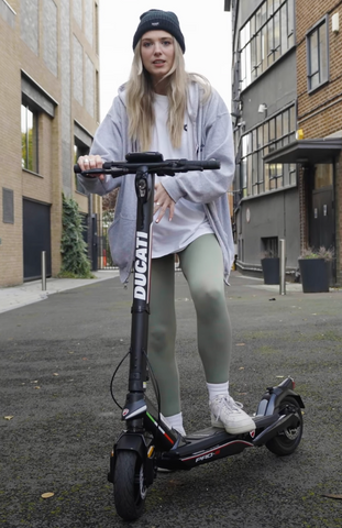 Eilis getting ready ti review Ducati's latest electric scooter