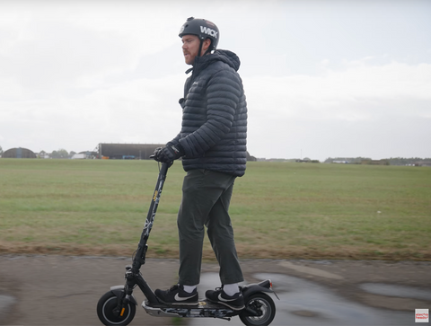 Richard on the Jeep scooter at an airfield