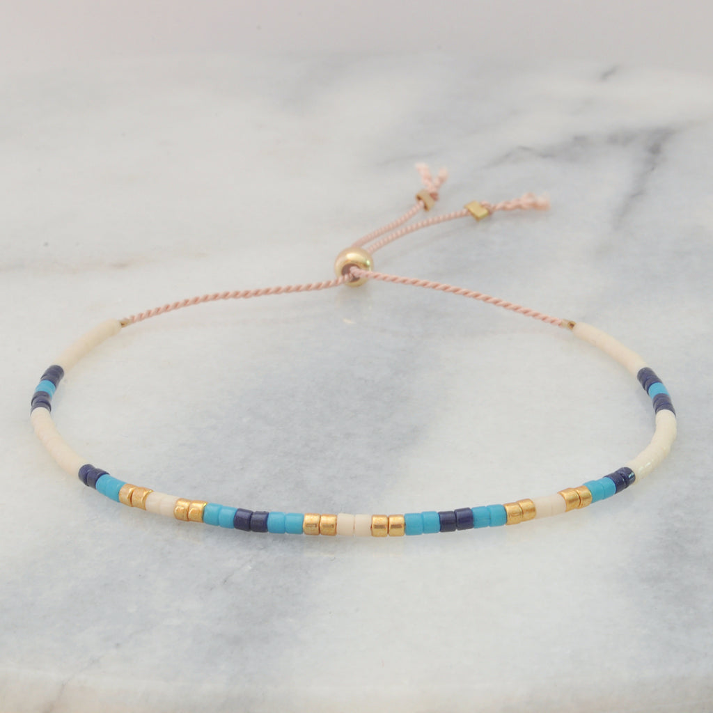 Beaded String Bracelet — THE ONE