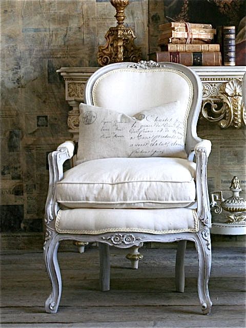 love the white chair, the cushion, the old ornate mantle, the old books, old newspapers on the wall - just everything! ZsaZsa Bellagio: french