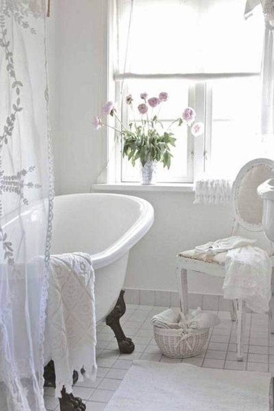 white shabby chic bathroom with vintage tub