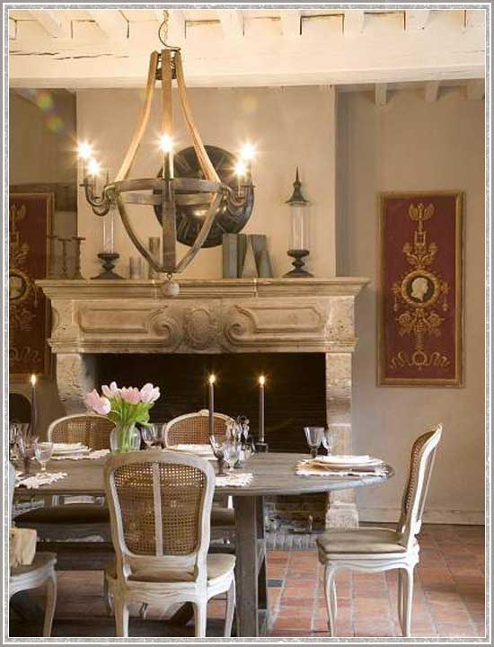 A Fanciful Chandelier Casts Warm Light in This Romantic Rustic Dining Room 