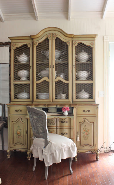French country arched cabinet