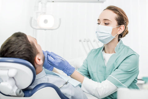 dental patient with oral hygienist