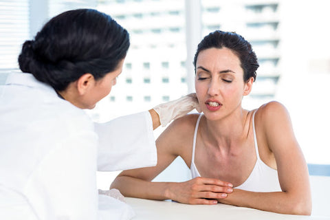 A woman getting trigger point relief for jaw pain