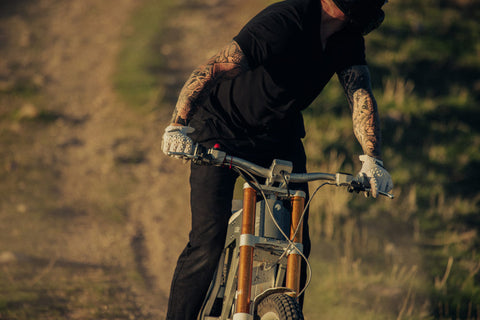 closeup of rider with arm tats