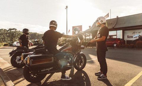 group of riders in parking lot