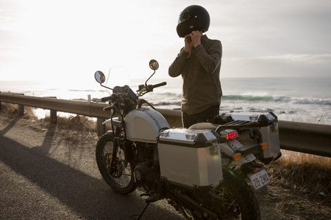 rider adjusting helmet