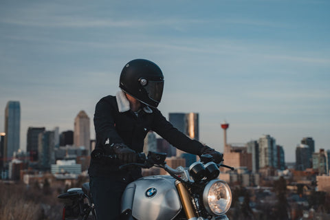 rider with the city in the background