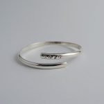 Hugs and Kisses Baby Bangle in Sterling Silver