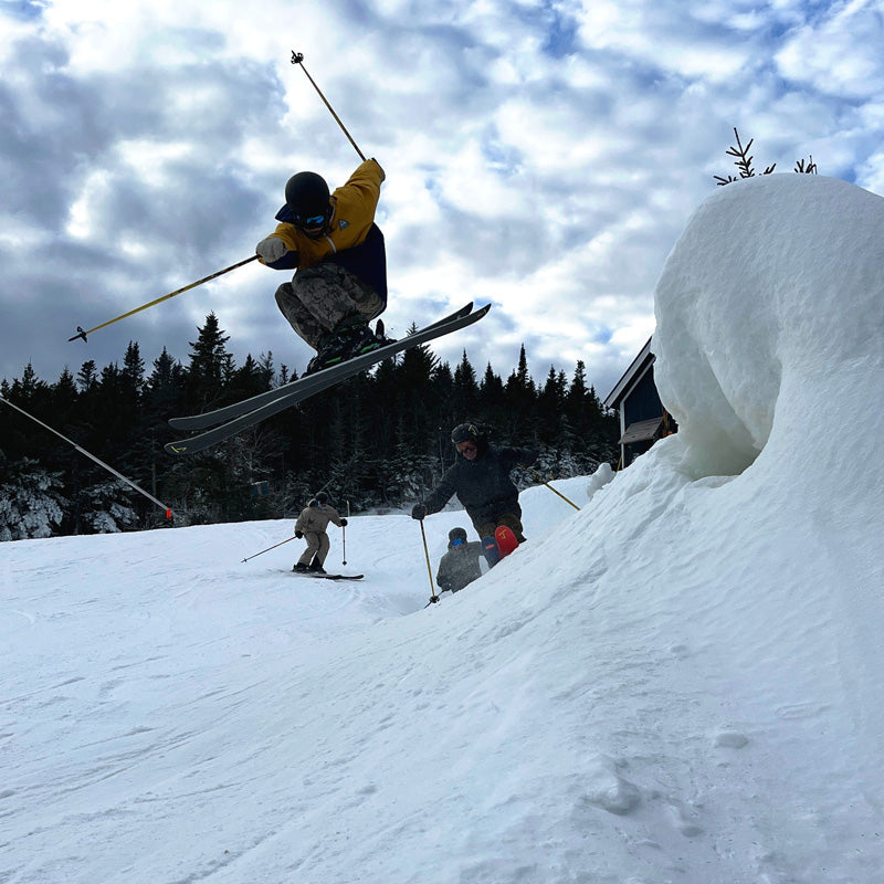 skiers jumping and slashing on new prototype J skis