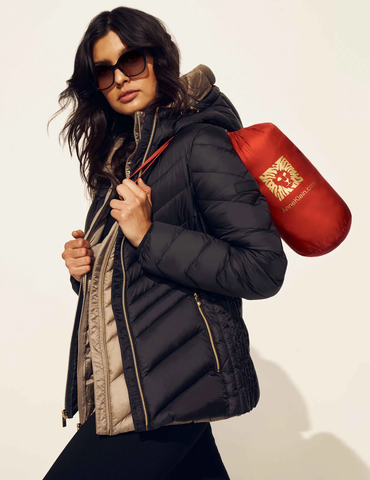 Model wearing the Chevron Packable Puffer Jacket from Anne Klein