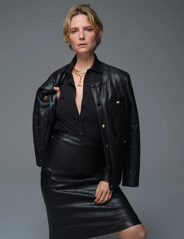 Model wearing the Collarless Vegan Leather Quilted Jacket by Anne Klein.