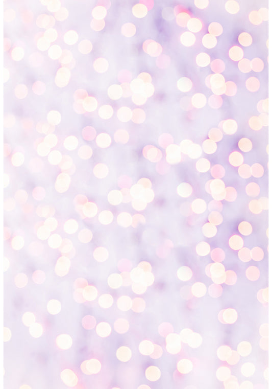 A blurry pink background with circles of light. Bokeh pink