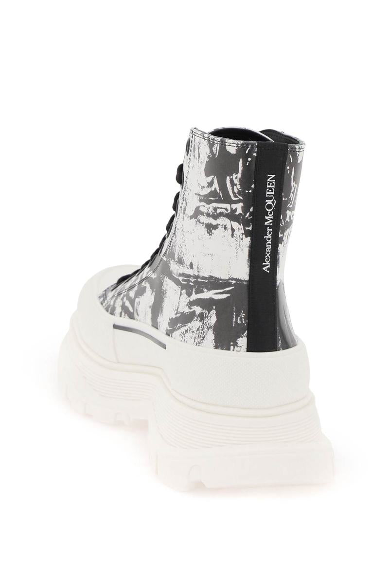 Shop Alexander Mcqueen 'tread Slick Graffiti' Ankle Boots In Nero