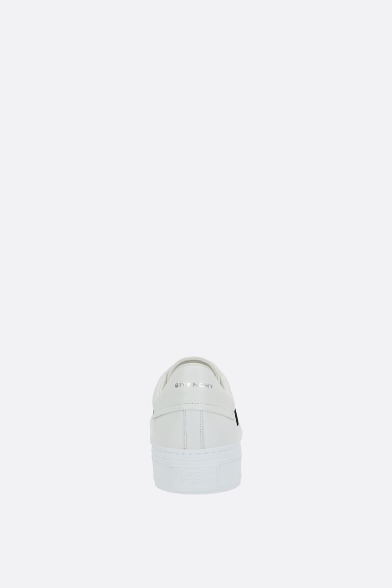 Shop Givenchy Sneakers In White+black