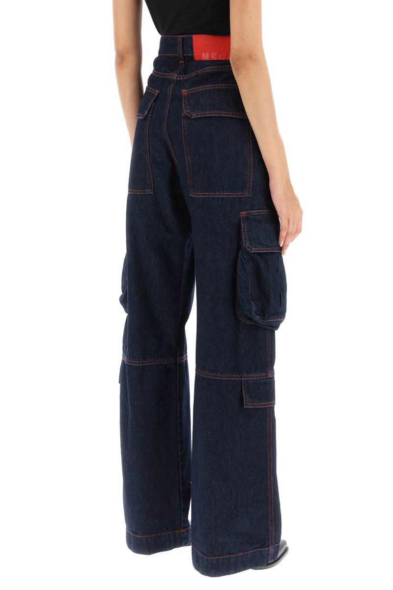 Shop Msgm Cargo Jeans With Flared Cut In Blu
