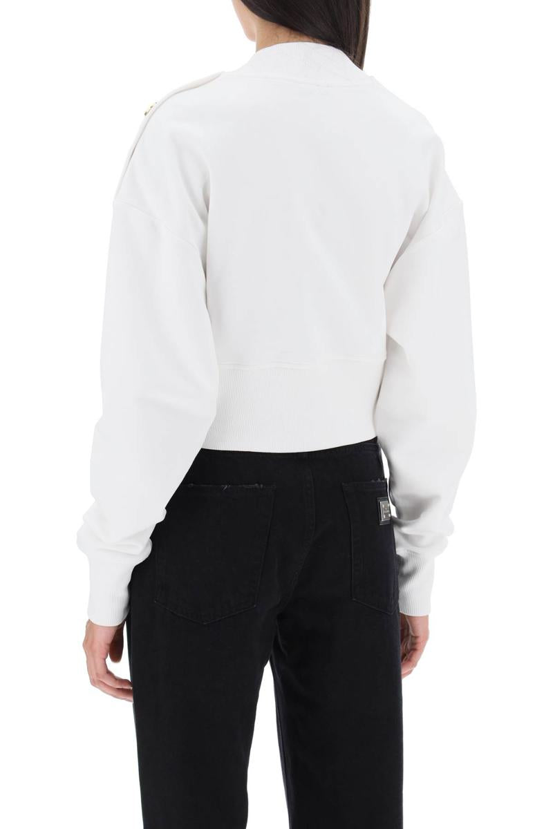 Shop Balmain Cropped Sweatshirt With Logo Print And Buttons In Bianco