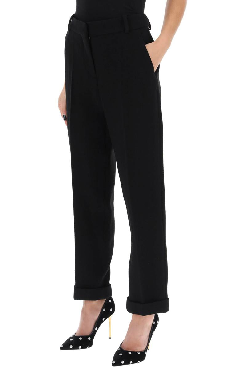 Shop Balmain Cuffed Wool Crepe Trousers In Nero