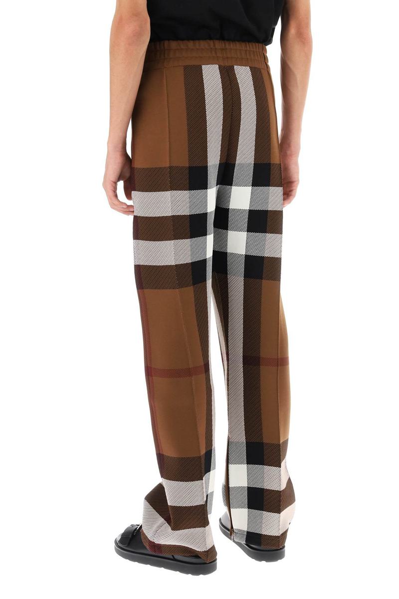Shop Burberry Check Track Pants In Marrone