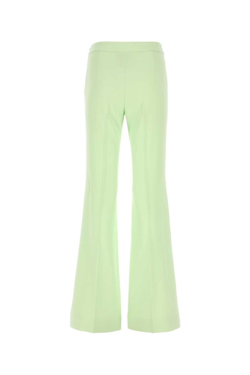Shop Moschino Pants In Green