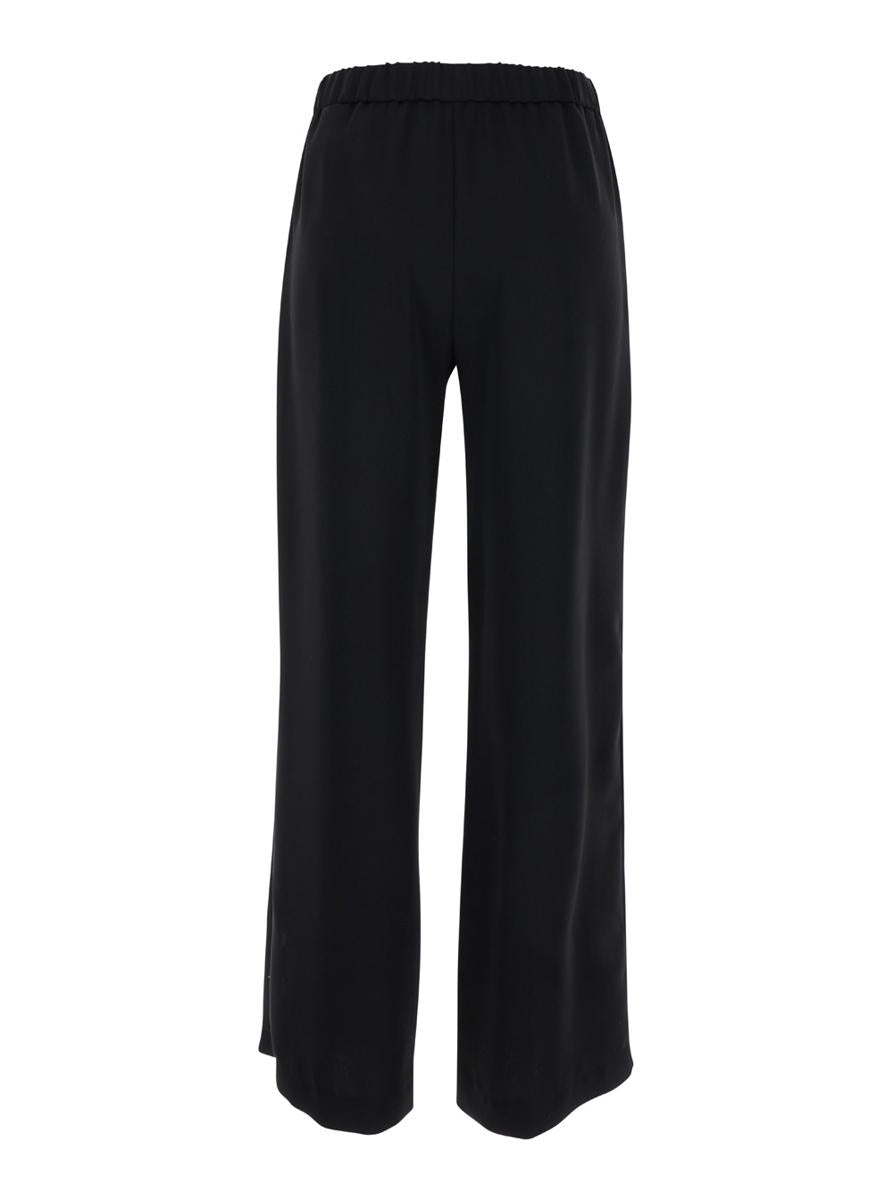 Shop Plain Black Relaxed Pants With Elastic Waistband In Fabric Woman