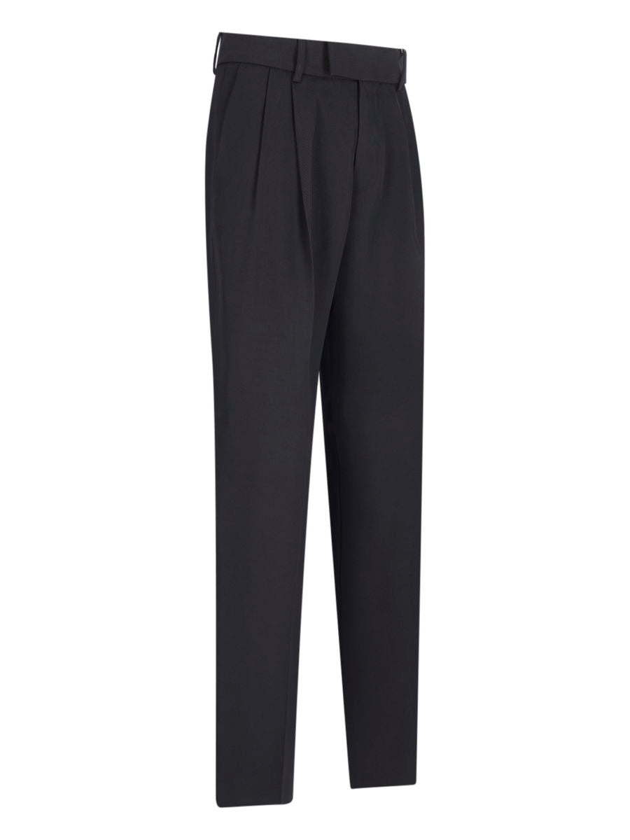 Shop Amiri Trousers In Black