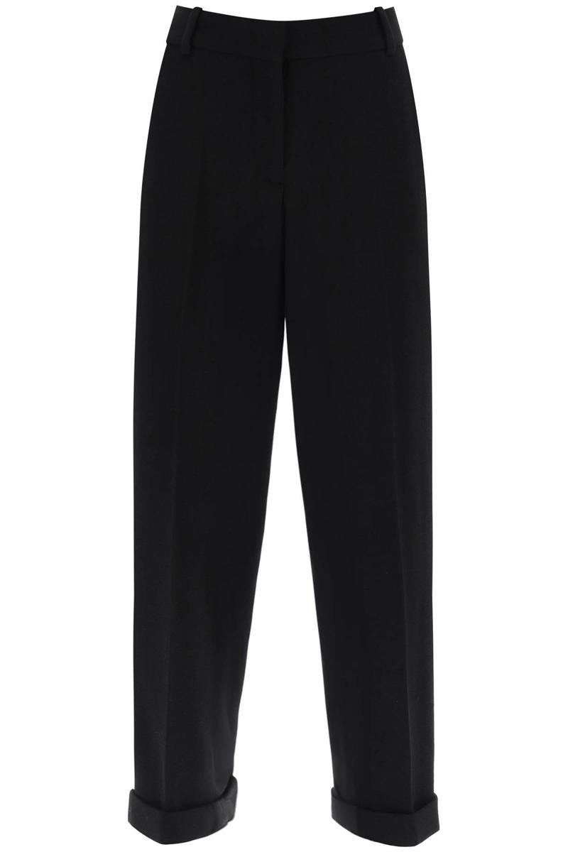 Shop Balmain Cuffed Wool Crepe Trousers In Nero