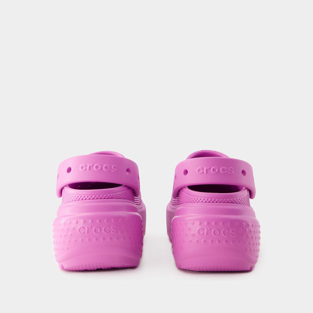 Shop Crocs Sandals In Pink