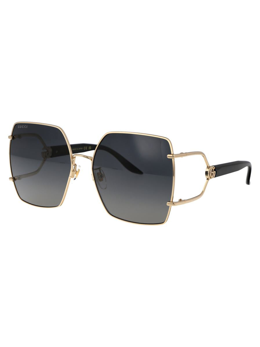 Shop Gucci Sunglasses In 001 Gold Black Grey