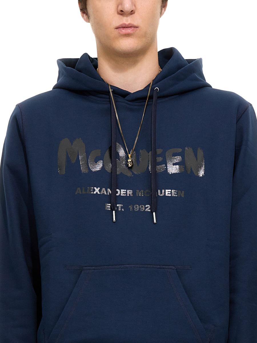 Shop Alexander Mcqueen Graffiti Logo Print Sweatshirt In Blue