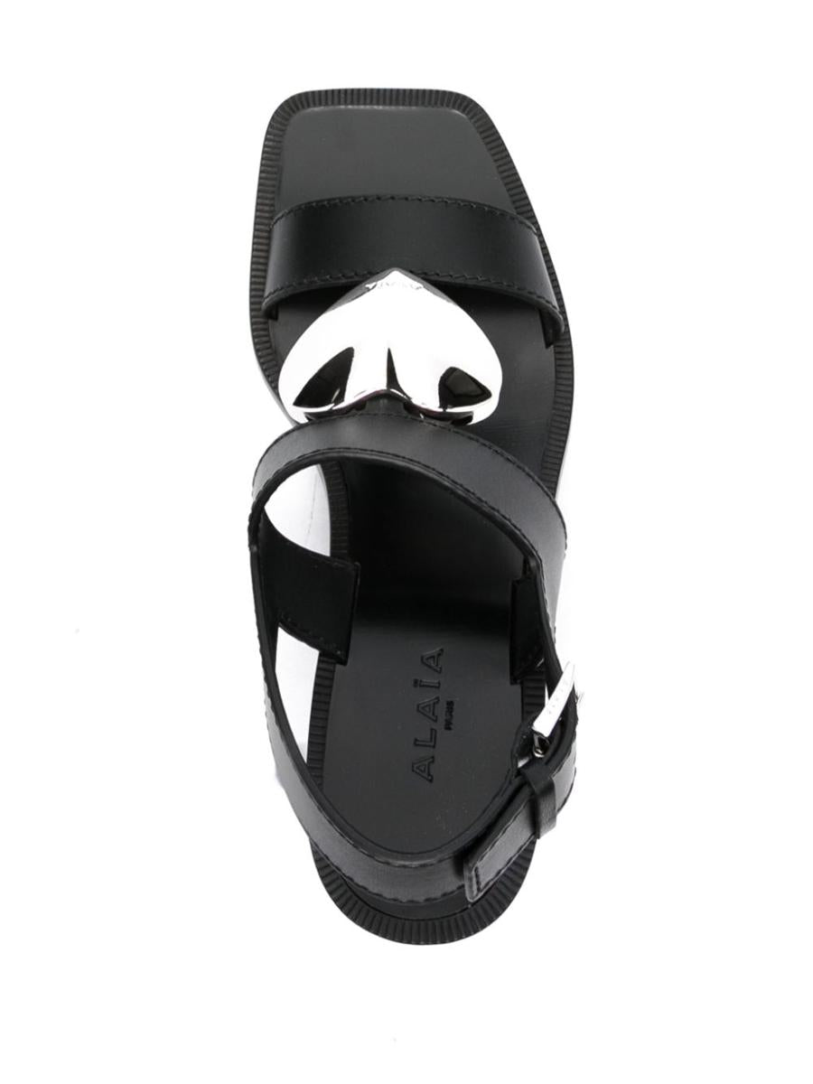 Shop Alaïa Sandals In Black