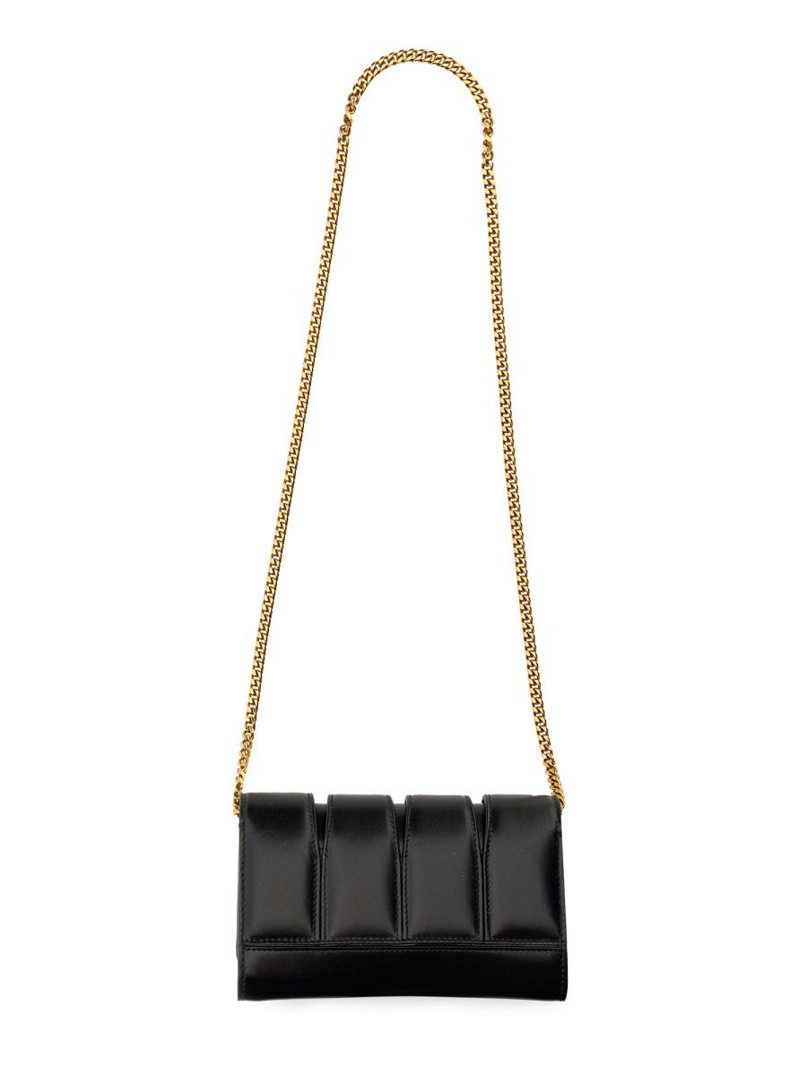 Shop Alexander Mcqueen The Slash Clutch Bag In Black