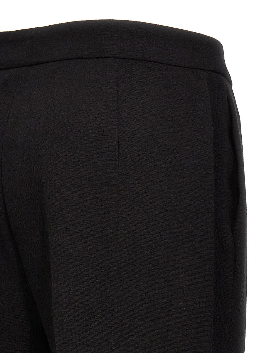 Moschino Wide-leg Wool Blend Crepe Pants With Central Pleat In Black