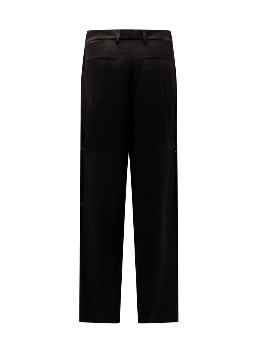 Shop Amiri Trousers In Black