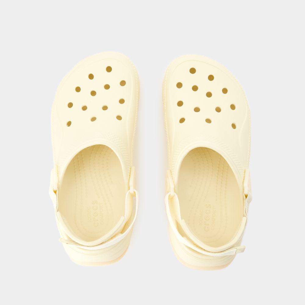 Shop Crocs Sandals In Beige