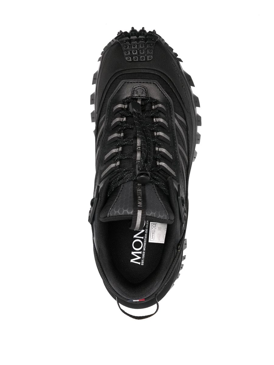 Shop Moncler Sneakers In Black