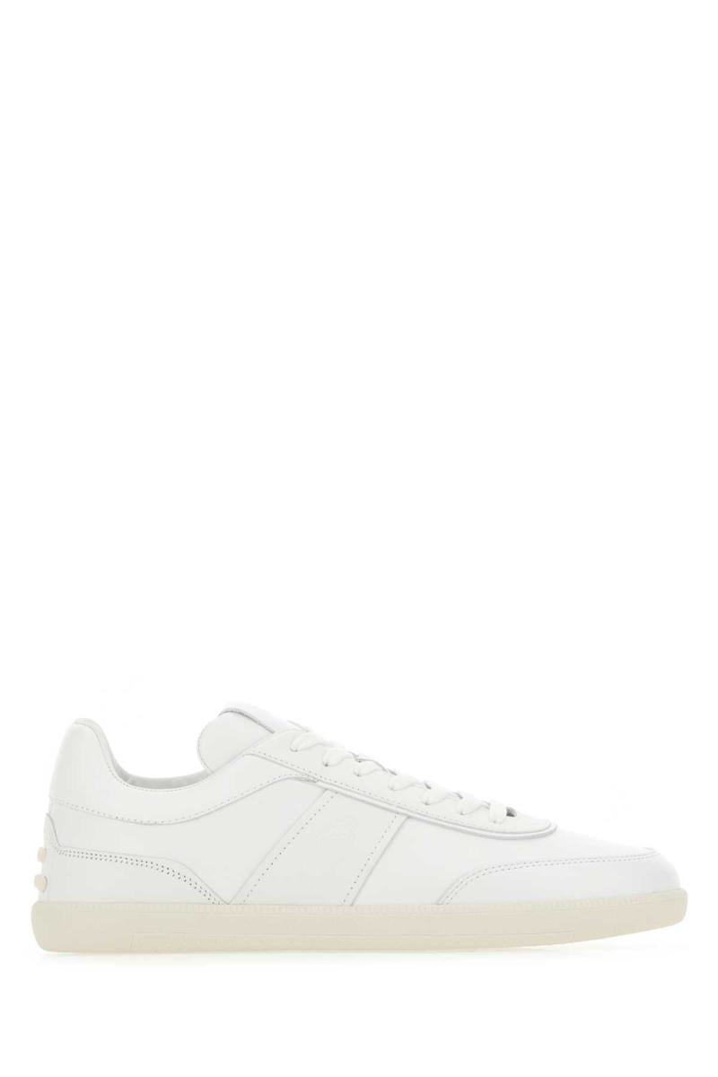 Shop Tod's Sneakers In White