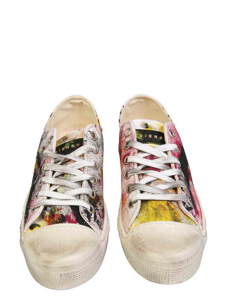 Shop Gienchi Jean Michel Low Sneakers In White