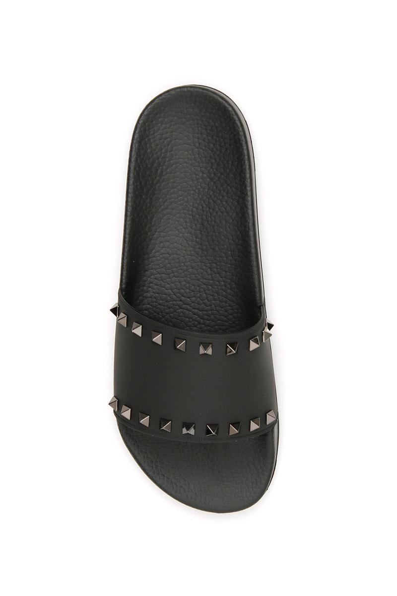 Shop Valentino 'rockstud' Slides In Nero