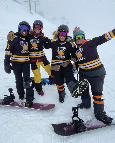 4 women with team jerseys for Crystal Mountain’s Verde Valle Banked Slalom