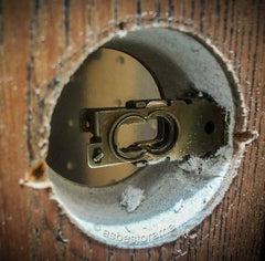 inside lock mechanism of asbestos fire door