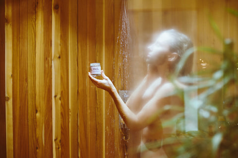 Hello Sunday girl in shower holding clay mask jar
