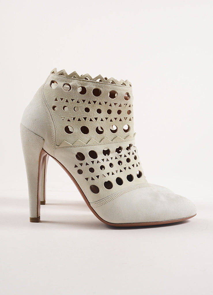 Alaia | Alaia Cream Suede Cut Out Zip Heeled Ankle Boots – Luxury ...