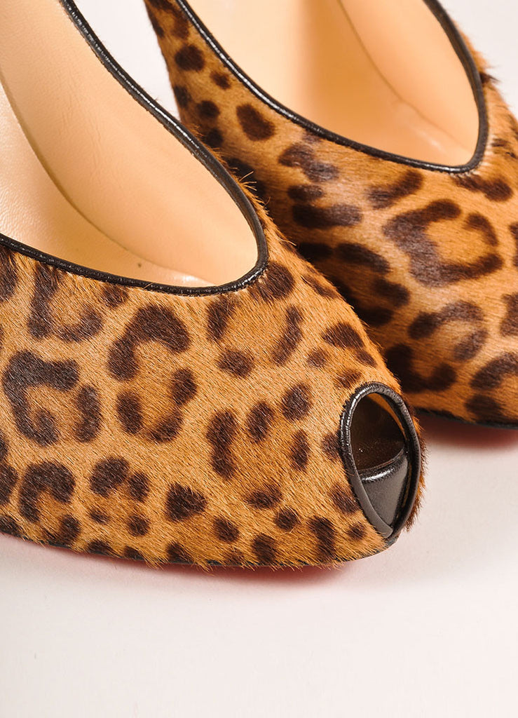 leopard round toe pumps